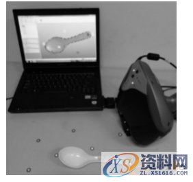 UG塑胶模具设计:逆向工程与快速原型的三维模型重构,三维,模具设计,第3张 UG塑胶模具设计:逆向工程与快速原型的三维模型重构,图2 用手持式激光扫描仪扫描汤匙表面,三维,模具设计,第3张